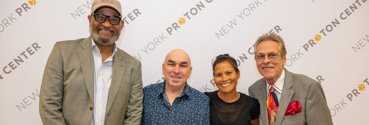 Patients of the New York Proton Center posing together at the center's 5th Anniversary celebration.